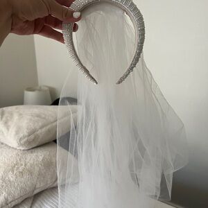 White Bridal Hair Accessory with Flowing Veil